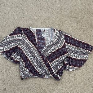 Sadie and Sage small, multi-colored cropped shirt.